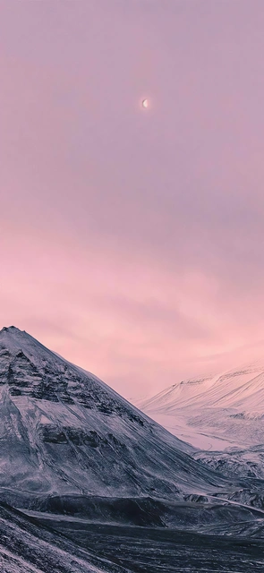 Snowy Peaks Under Pink Twilight Moon