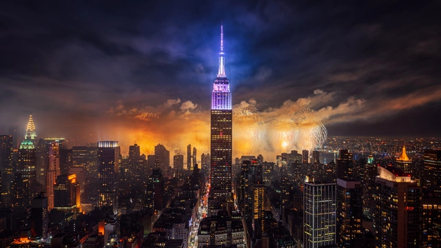 City Fireworks Under the Night Sky