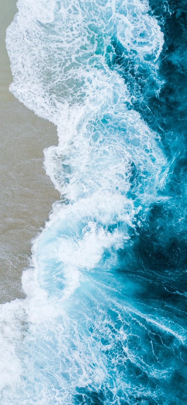 Aerial View of Blue Ocean Waves
