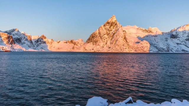 Snowy Mountain Fjord at Sunset