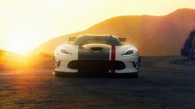 Sports Car on a Sunset Mountain Road