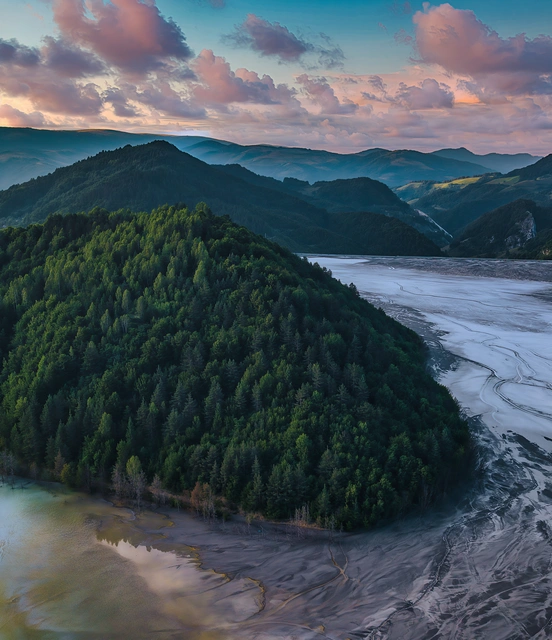 Green Valley Under Colorful Clouds